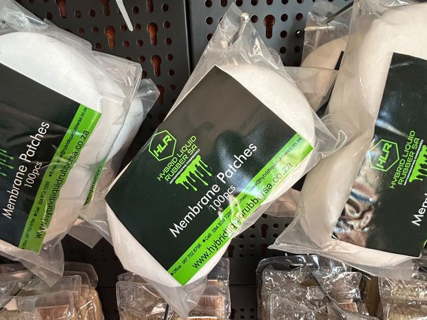 Packs of HLR Membrane Patches and brushes hanging on the shelf in store